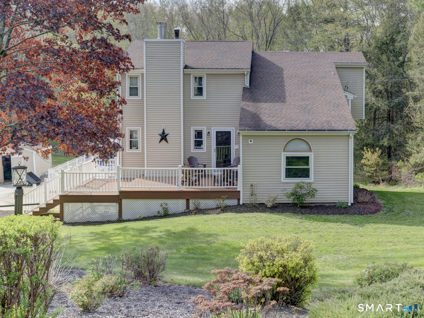 97 Lair Road New Hartford, CT 06057 - Photo 1 of 39 a view of a house with a yard and sitting area