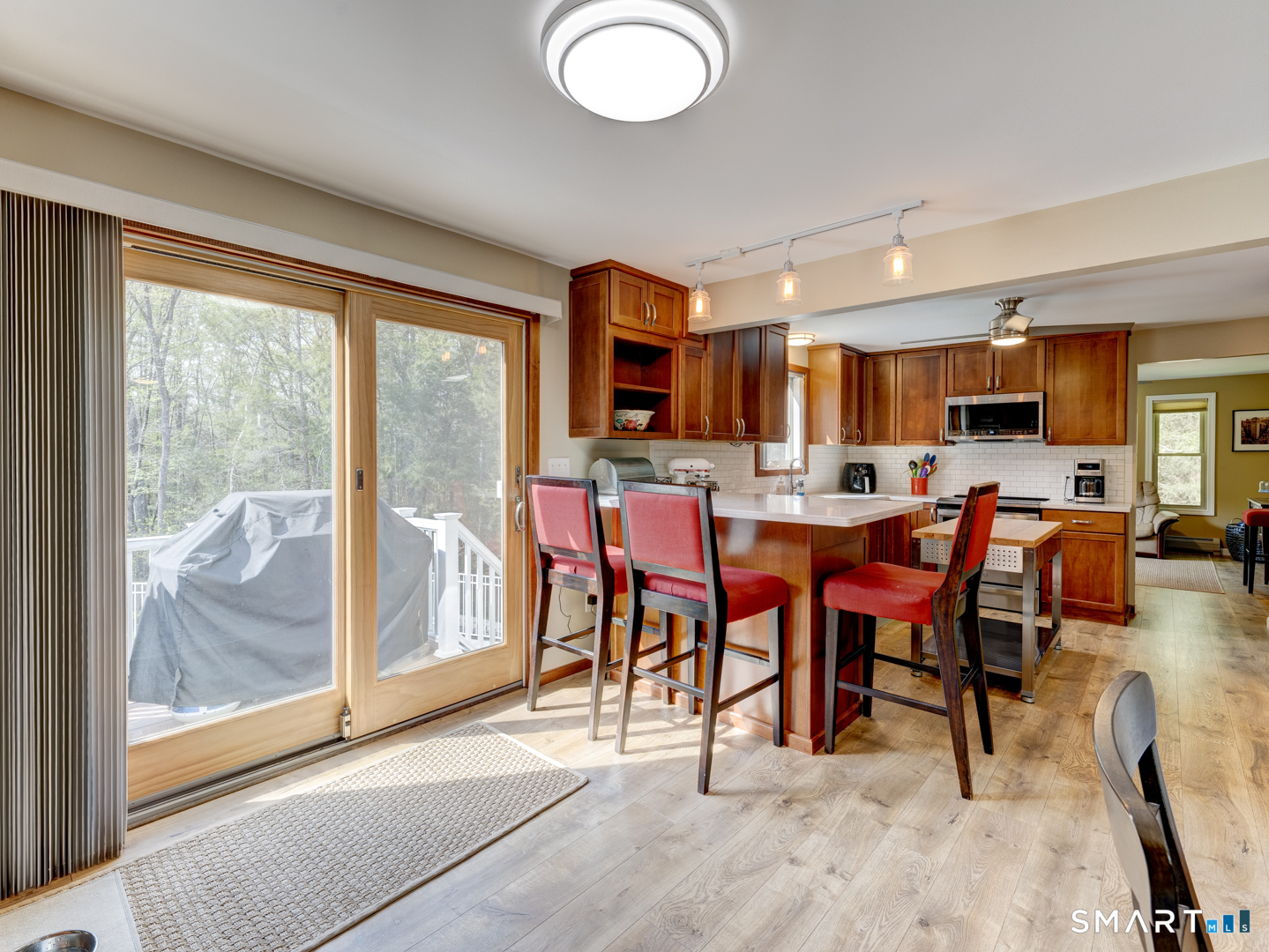 97 Lair Road New Hartford, CT 06057 - Photo 13 of 39 a view of a dining room with furniture window and outside view