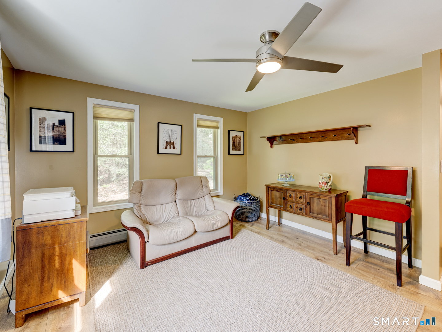 97 Lair Road New Hartford, CT 06057 - Photo 21 of 39 a living room with furniture and a piano