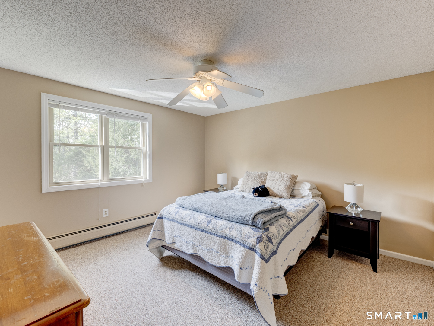 97 Lair Road New Hartford, CT 06057 - Photo 29 of 39 a spacious bedroom with a bed and a window