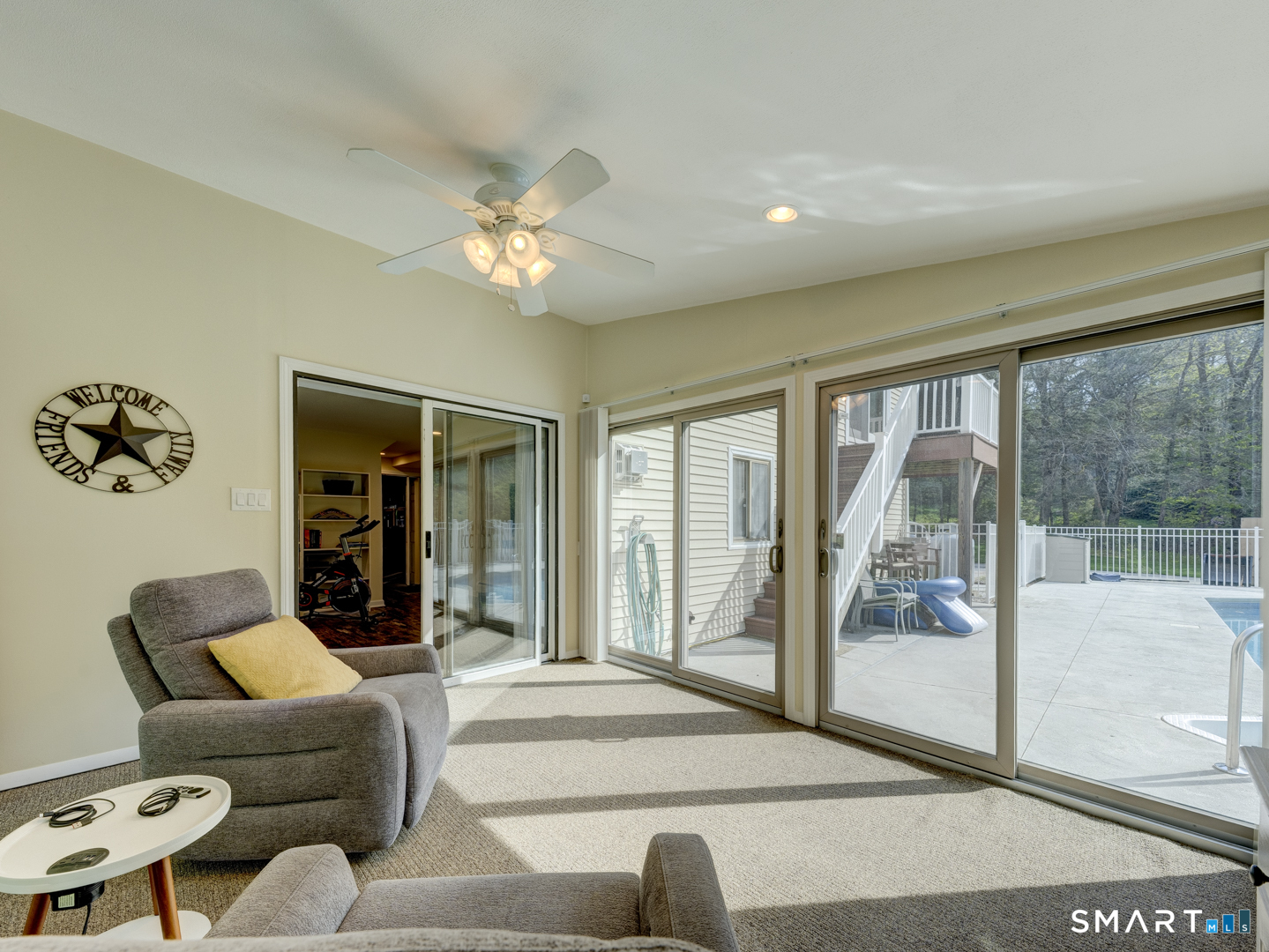 97 Lair Road New Hartford, CT 06057 - Photo 35 of 39 a living room with furniture and a large window