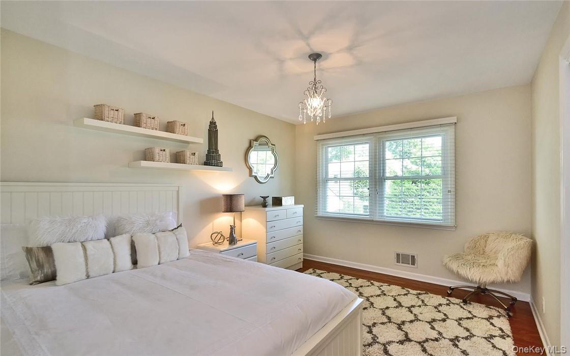 9 Franklin Avenue Rye, NY 10580 - Photo 18 of 35 a bedroom with a bed and window