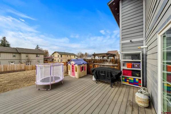 a view of roof deck with patio