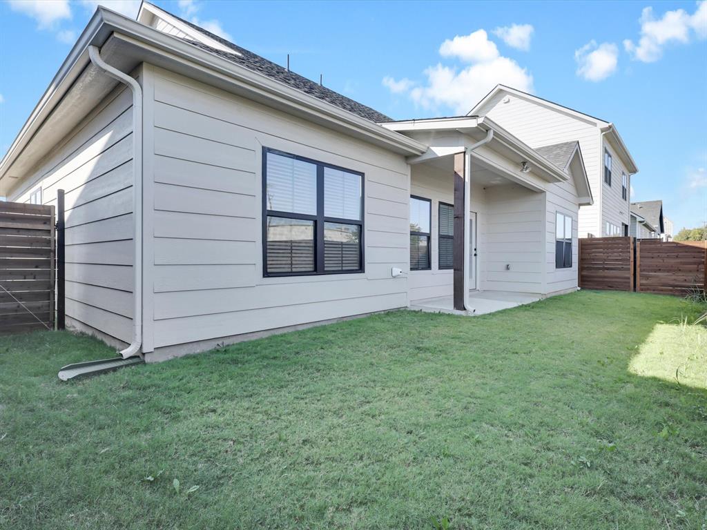 4905 Sweetbay Road Sherman, TX 75092 - Photo 25 of 26 a view of a house with a backyard