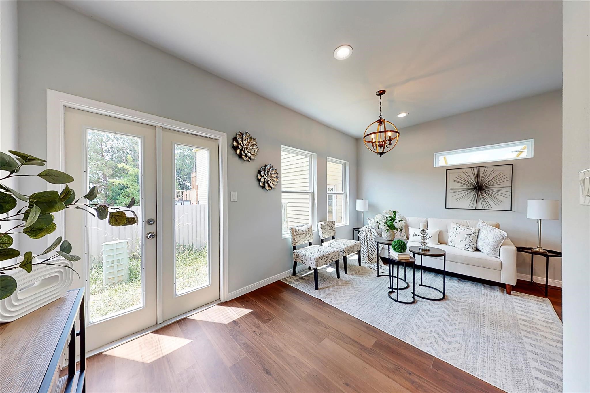 18813 Luminescent Lane Spring, TX 77379 - Photo 6 of 19 a living room with furniture and a large window