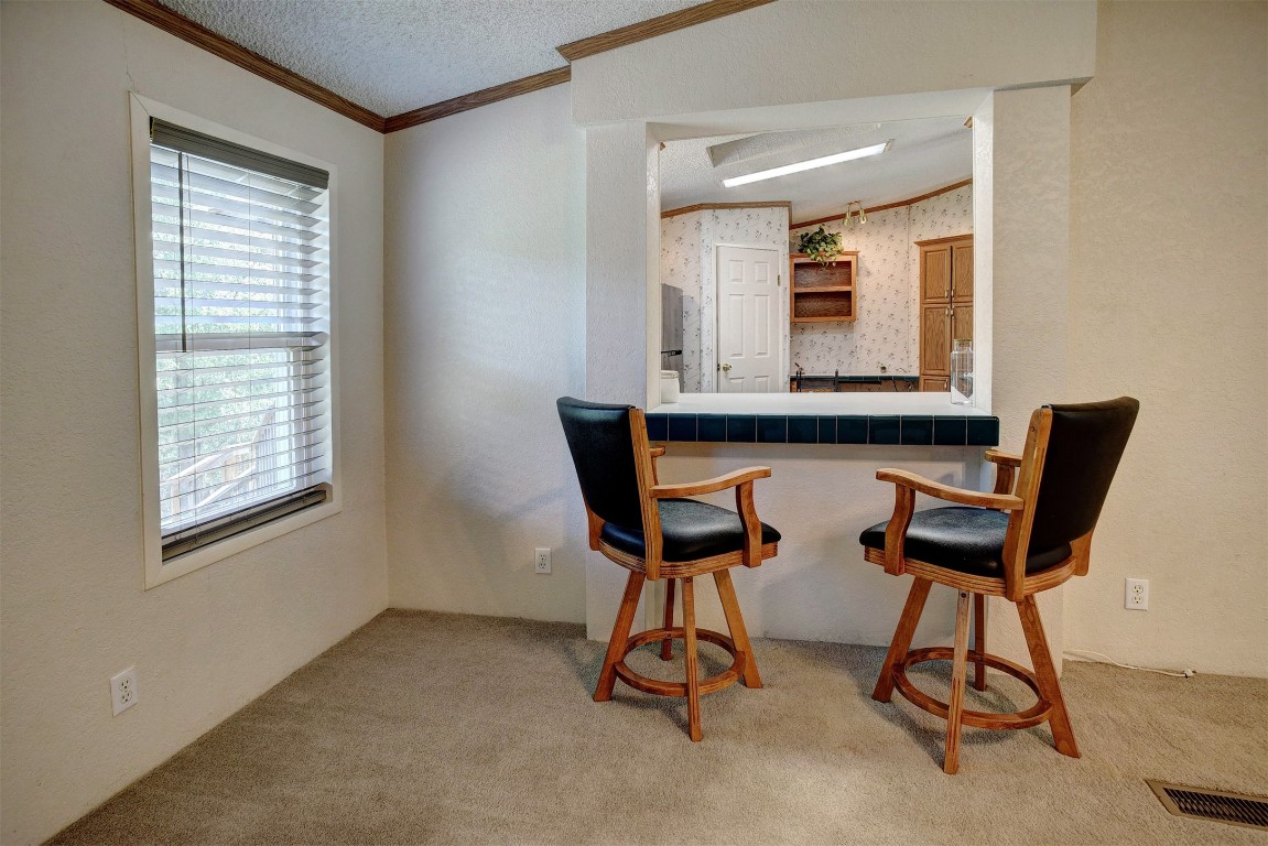243 Piney Ridge Drive Bastrop, TX 78602 - Photo 12 of 40 a view of a room with gym equipment and a window