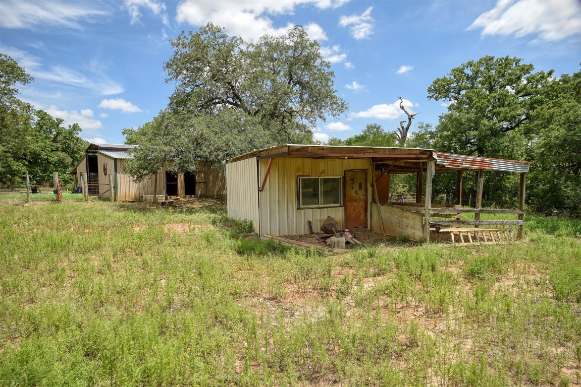 243 Piney Ridge Drive Bastrop, TX 78602 - Photo 29 of 40 a view of a house with backyard