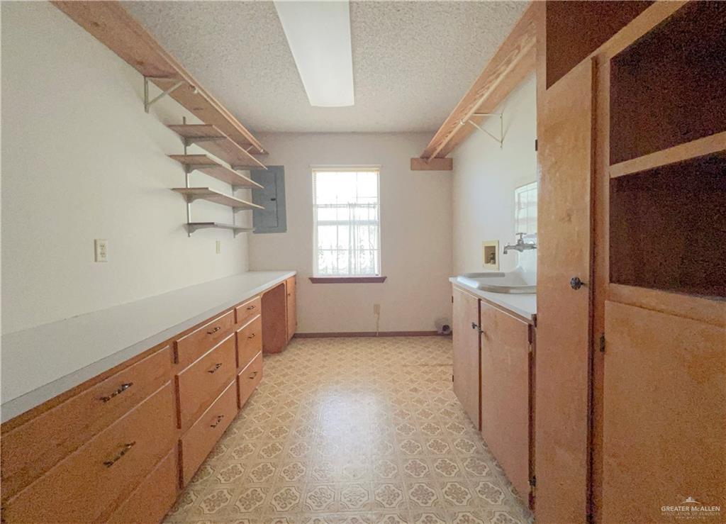 218 East Colorado Street Rio Hondo, TX 78583 - Photo 12 of 18 a view of a kitchen with electric equipment