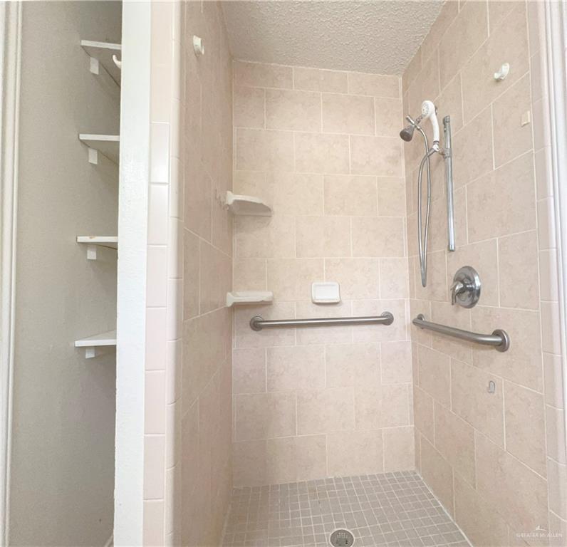 218 East Colorado Street Rio Hondo, TX 78583 - Photo 7 of 18 a bathroom with a shower