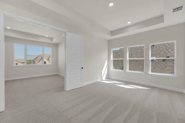 an empty room with shelves