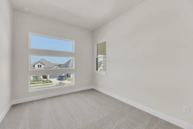 a group of people sitting on a park