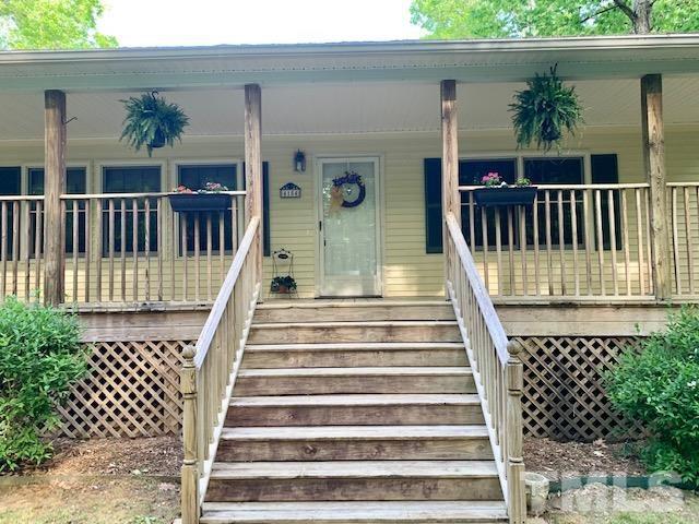 4154 Culbreth Road Stem, NC 27581 - Photo 2 of 19 a view of a house with a deck