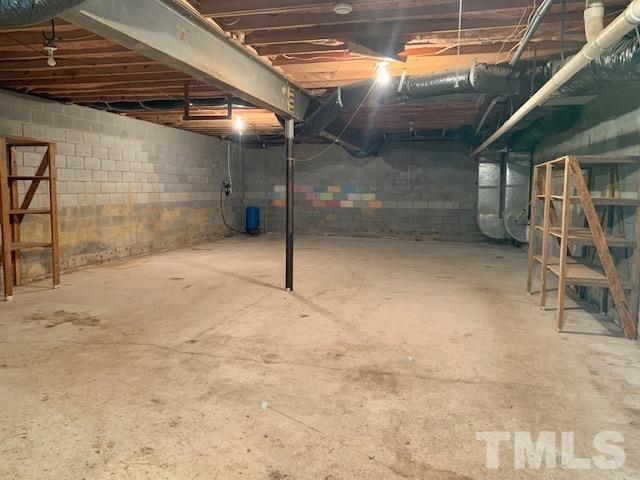 4154 Culbreth Road Stem, NC 27581 - Photo 14 of 19 a view of empty room with wooden ceiling