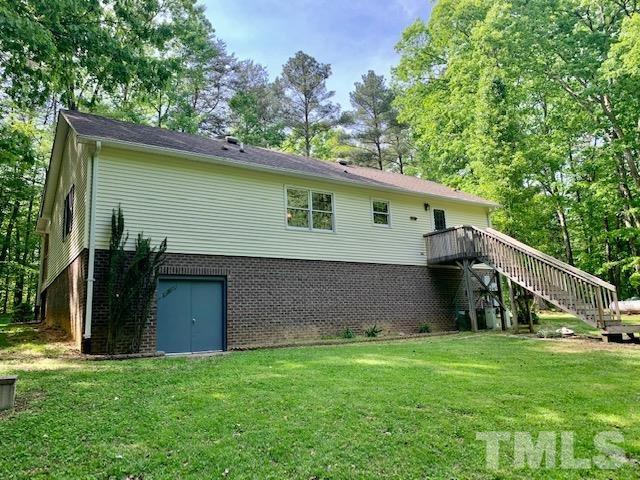 4154 Culbreth Road Stem, NC 27581 - Photo 16 of 19 a view of house with backyard