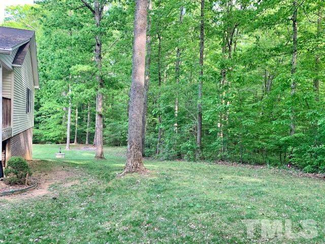 4154 Culbreth Road Stem, NC 27581 - Photo 18 of 19 a view of a lush green forest