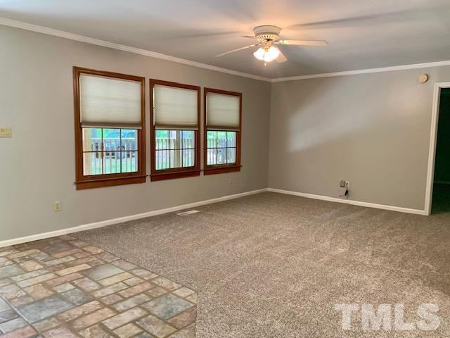 4154 Culbreth Road Stem, NC 27581 - Photo 3 of 19 a view of an empty room with a window