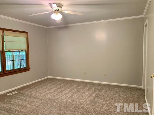 4154 Culbreth Road Stem, NC 27581 - Photo 7 of 19 a view of empty room with window