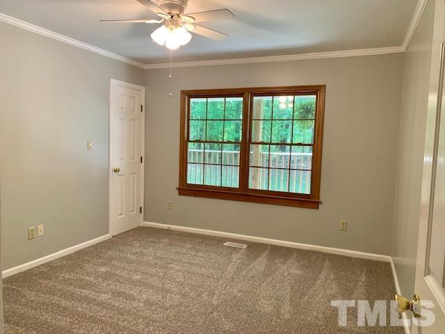 4154 Culbreth Road Stem, NC 27581 - Photo 8 of 19 a view of an empty room with a window