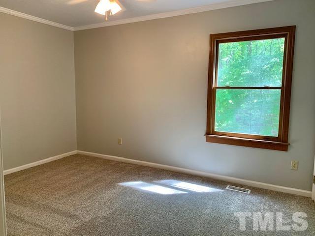 4154 Culbreth Road Stem, NC 27581 - Photo 9 of 19 a view of an empty room with a window