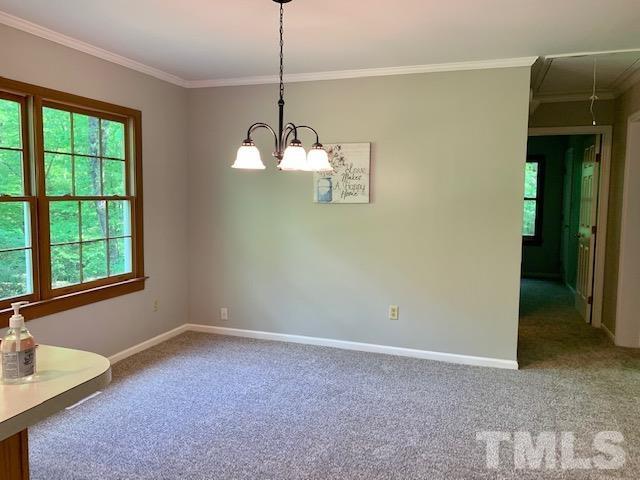 4154 Culbreth Road Stem, NC 27581 - Photo 10 of 19 a view of a room with a windows and ceiling fan