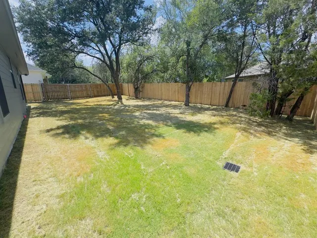 a view of an outdoor space and a yard