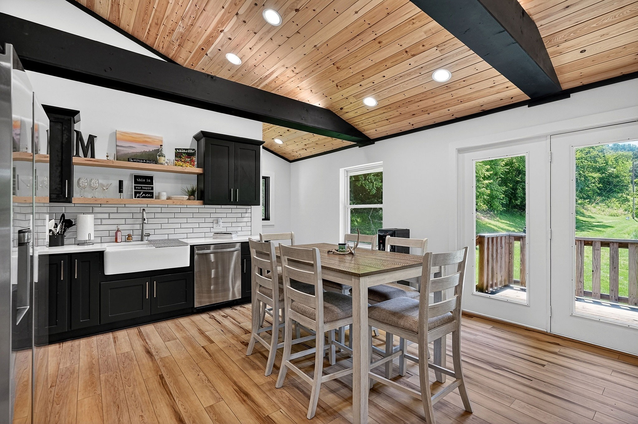 99 Judkins Road Hickman, TN 38567 - Photo 6 of 62 a view of a dining room with furniture window and wooden floor