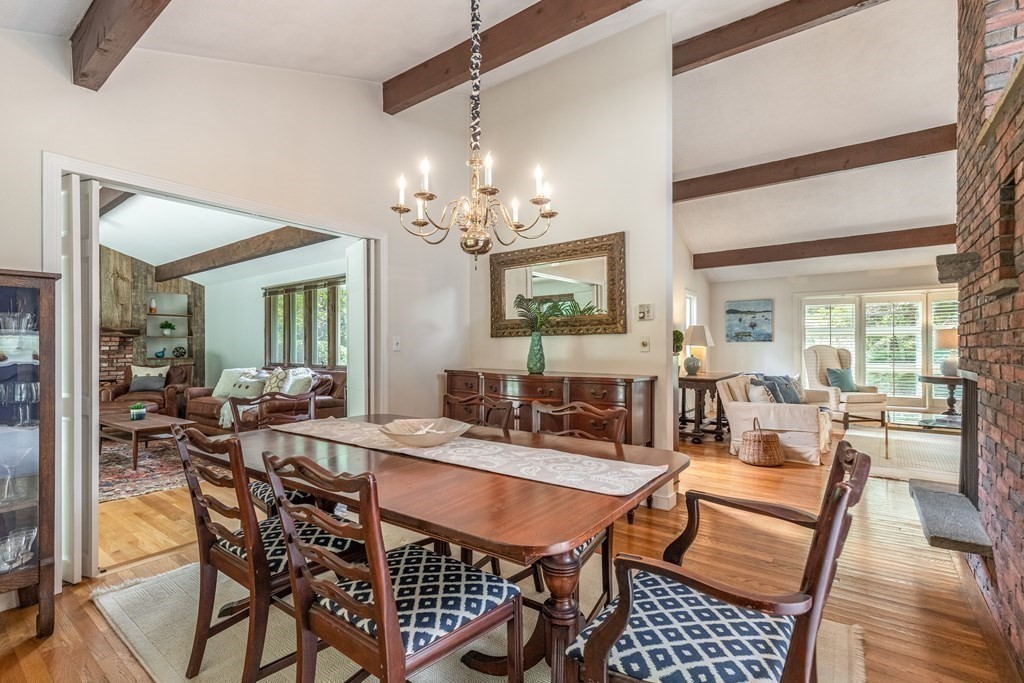 14 Driftwood Road Marblehead, MA 01945 - Photo 11 of 30 a view of a dining room with furniture and wooden floor