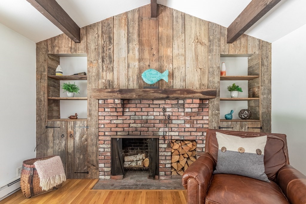 14 Driftwood Road Marblehead, MA 01945 - Photo 13 of 30 a living room with furniture and a fireplace