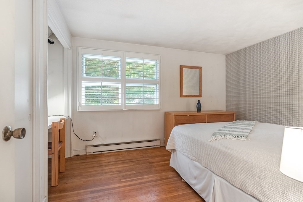 14 Driftwood Road Marblehead, MA 01945 - Photo 15 of 30 a bedroom with a bed and a window