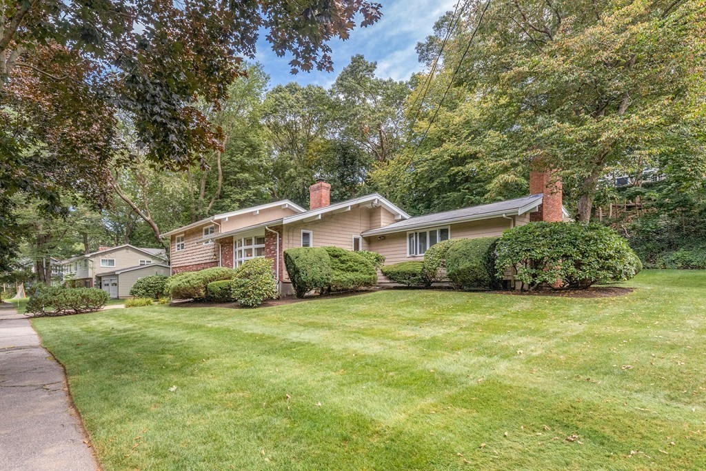 14 Driftwood Road Marblehead, MA 01945 - Photo 2 of 30 a front view of a house with a yard