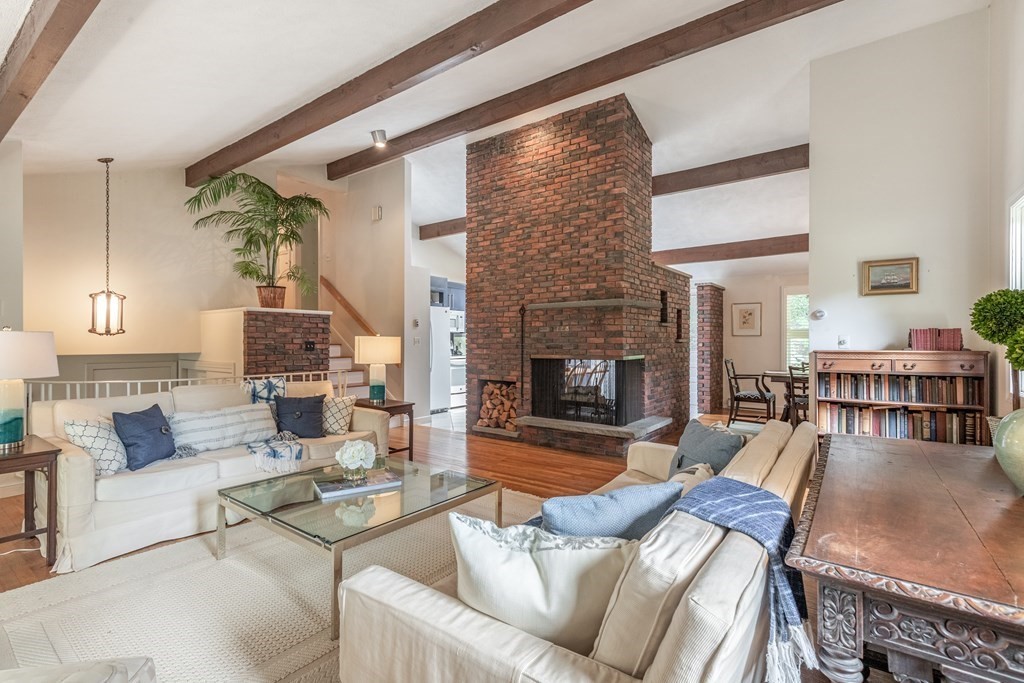 14 Driftwood Road Marblehead, MA 01945 - Photo 6 of 30 a living room with furniture wooden floor and a fireplace