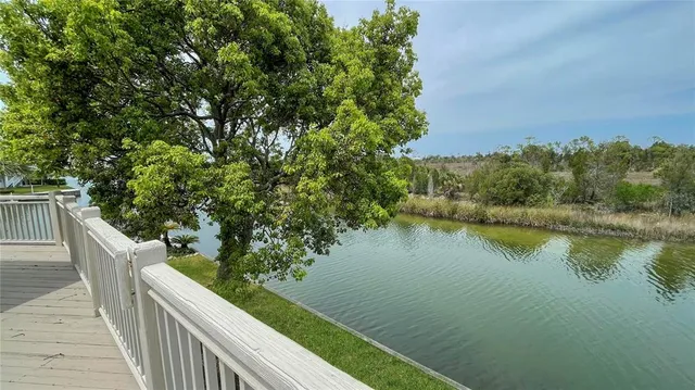 a view of a lake from a balcony