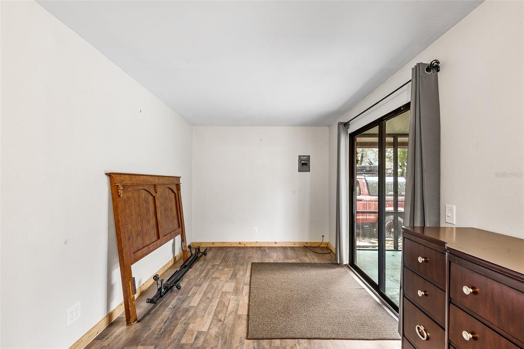 1233 St Anne Shrine Road Lake Wales, FL 33898 - Photo 24 of 47 a view of hallway with window and wooden floor