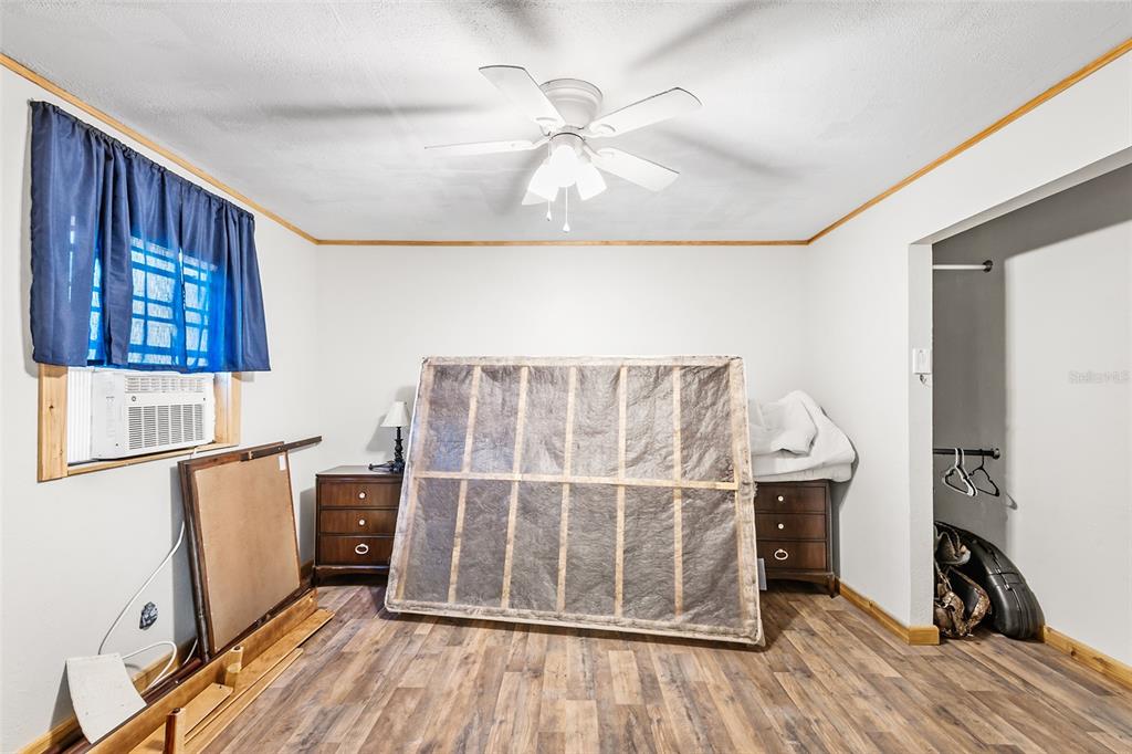 1233 St Anne Shrine Road Lake Wales, FL 33898 - Photo 27 of 47 a view of wooden floor and windows in a room