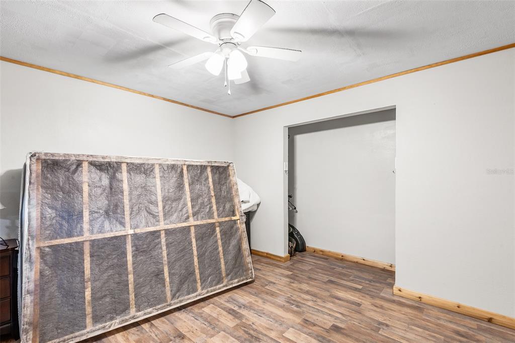 1233 St Anne Shrine Road Lake Wales, FL 33898 - Photo 28 of 47 a view of wooden floor in a room