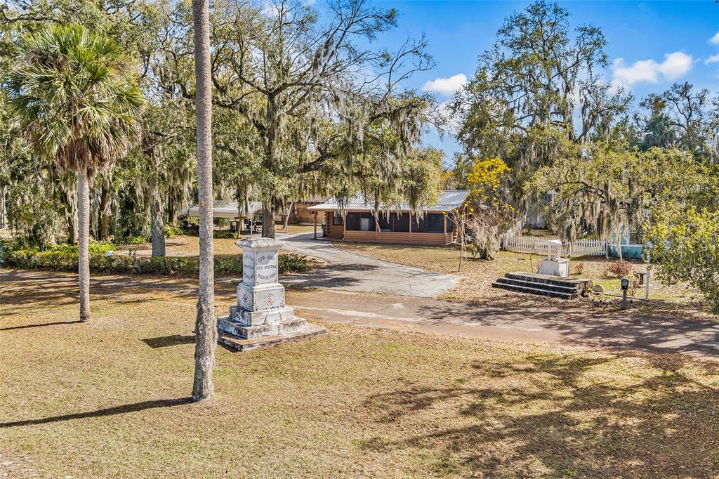 1233 St Anne Shrine Road Lake Wales, FL 33898 - Photo 37 of 47 a view of a yard with yellow house