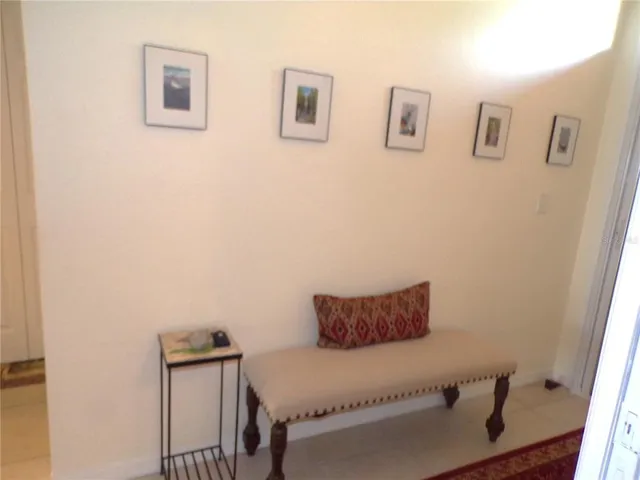 a living room with a flat screen tv and a fireplace