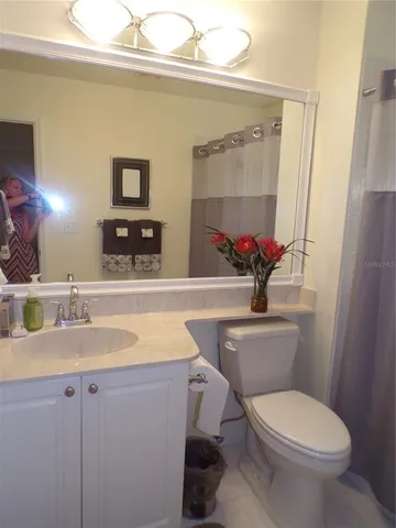 a view of a swimming pool with a lounge chair