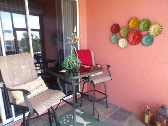 a view of a lake with a sitting area