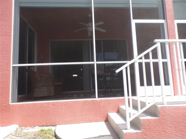 a view of house with outdoor seating