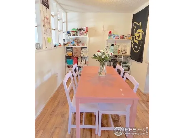 a bedroom with a bed and a closet