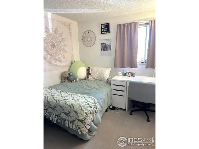 a view of a chairs and table in the patio