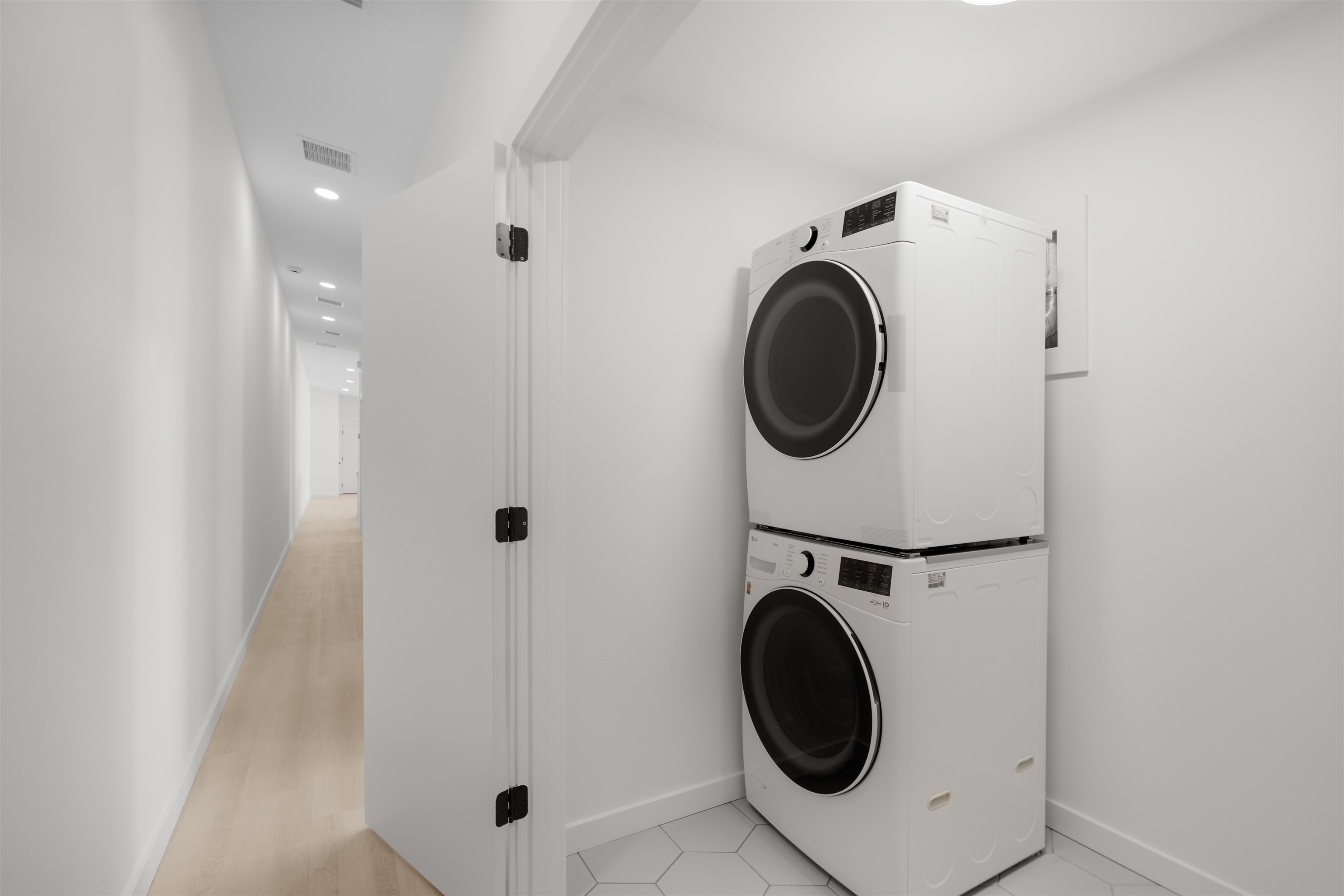 29 Masters Drive, Unit B St. Augustine, FL 32084 - Photo 11 of 28 a utility room with dryer and washer
