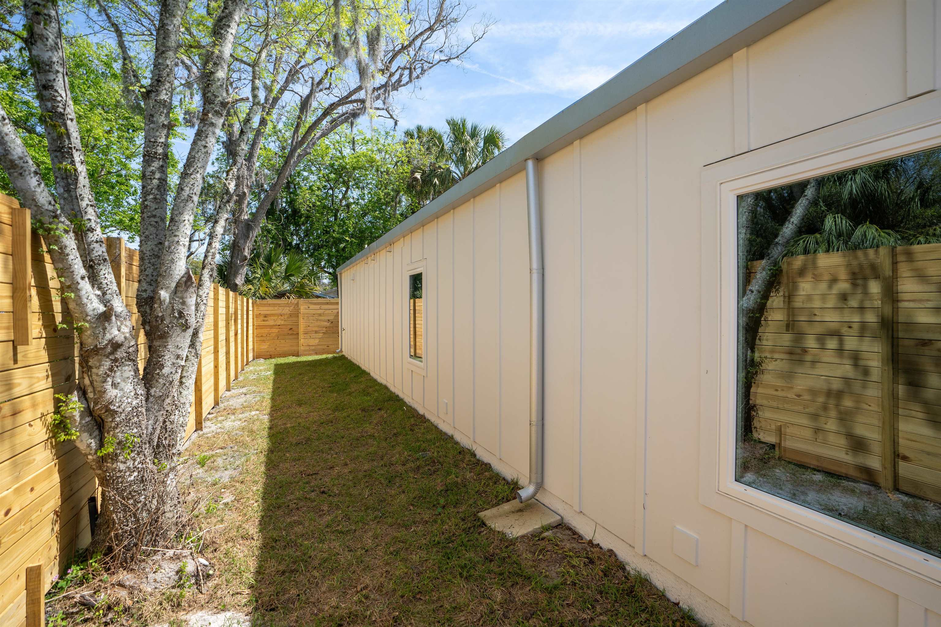 29 Masters Drive, Unit B St. Augustine, FL 32084 - Photo 21 of 28 a view of a pathway of a house with a yard