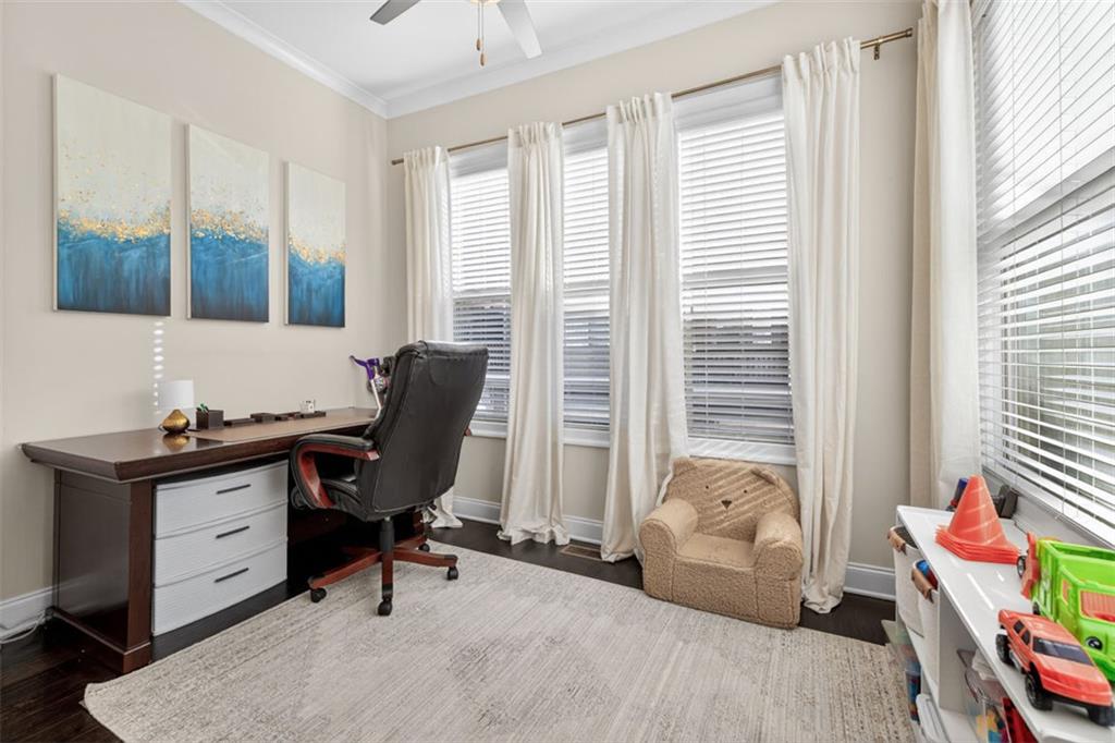 7012 Seneca Court Roswell, GA 30076 - Photo 15 of 65 a view of a workspace with furniture and a window