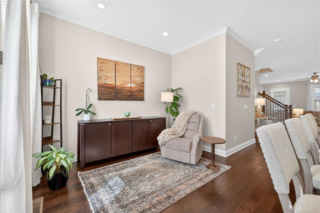 7012 Seneca Court Roswell, GA 30076 - Photo 17 of 65 a living room with furniture and a rug