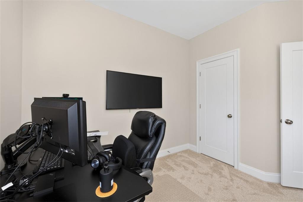 7012 Seneca Court Roswell, GA 30076 - Photo 25 of 65 a view of workspace with wooden floor workspace