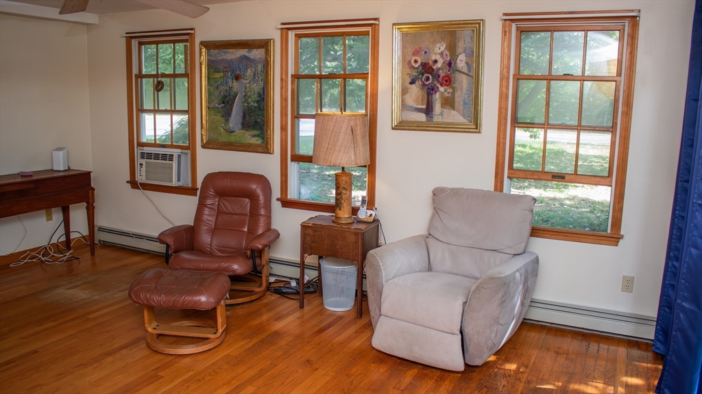562 North Avenue Rochester, MA 02770 - Photo 13 of 32 a living room with furniture and a window