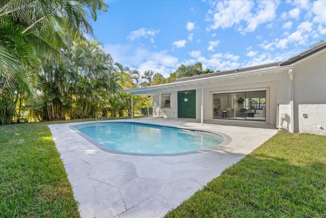 a view of outdoor space yard and swimming pool