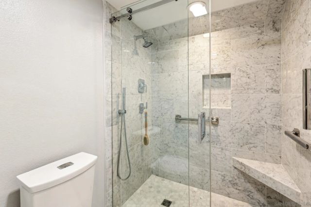 a bathroom with a sink double vanity and a mirror